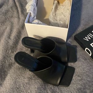 Brand new never worn black mules
